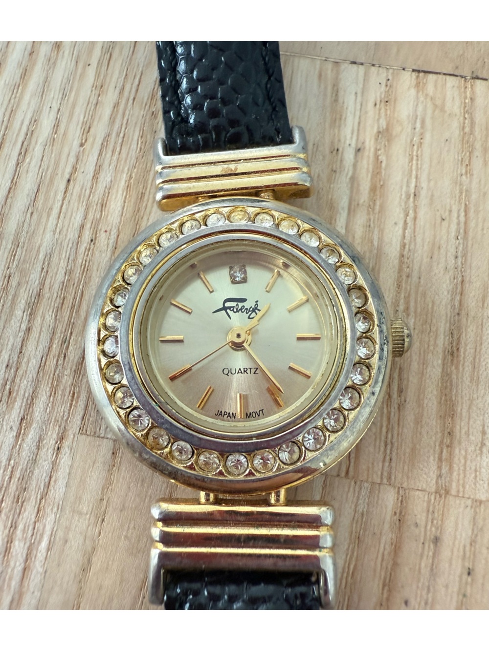Vintage faberge ladies gold tone black leather watch NEW BATTERY